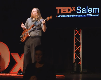 Jonathan Chase giving a TED talk in Salem on autism and music